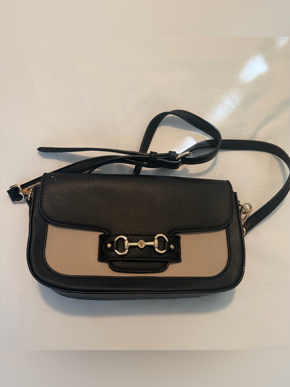 Two-Tone Black and Taupe Crossbody Bag with Gold Hardware